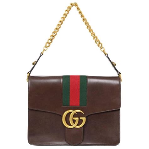 why do people think gucci is a clone|gucci purse knockoff.